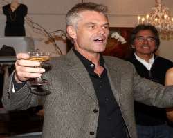 Harry Hamlin consuming alcohol